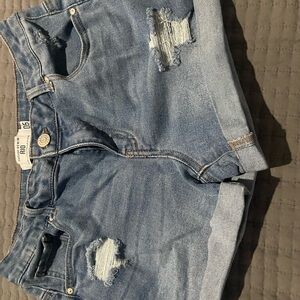 Ripped Blue Denim Shorts